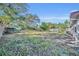 Fenced backyard offering privacy and ample outdoor space at 990 Sunrise Dr, Tarpon Springs, FL 34689