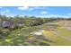 Scenic view of a well-maintained golf course, featuring lush green grass and sand traps at 5277 Epping Ln, Zephyrhills, FL 33541