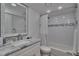 Clean bathroom with a shower/tub combo and marble vanity at 18400 Gulf Blvd # 1206, Indian Shores, FL 33785