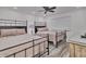 Bright bedroom featuring two twin beds with metal frames at 18400 Gulf Blvd # 1206, Indian Shores, FL 33785