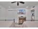 Well-lit bedroom with two twin beds and a dresser at 18400 Gulf Blvd # 1206, Indian Shores, FL 33785