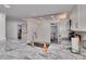 Modern kitchen with a large island and marble countertops at 18400 Gulf Blvd # 1206, Indian Shores, FL 33785