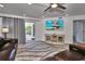 Relaxing living room with leather sectional and access to balcony at 18400 Gulf Blvd # 1206, Indian Shores, FL 33785
