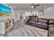 Open living room with a view of the kitchen and dining area at 18400 Gulf Blvd # 1206, Indian Shores, FL 33785