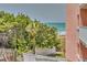 Peaceful ocean view from private patio, lush landscaping at 18400 Gulf Blvd # 1206, Indian Shores, FL 33785
