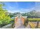 Wooden walkway leading to a private boat dock at 3832 5Th Ne Ave, Bradenton, FL 34208