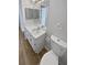 Bathroom with vanity, toilet, and mirror at 6844 Northlake Dr, Zephyrhills, FL 33542