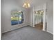 Bright dining room with a view and hardwood floors at 6844 Northlake Dr, Zephyrhills, FL 33542