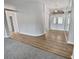 Light and spacious entryway with wood-look floors at 6844 Northlake Dr, Zephyrhills, FL 33542