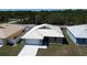 Well-placed single-story home with a lush lawn and modern metal roof in a quiet neighborhood at 12263 Cartouche Ave, Punta Gorda, FL 33955
