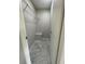 Walk-in closet with wire shelving and a built-in bench at 3145 Hidden Lake Dr, Wesley Chapel, FL 33543