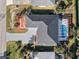 Bird's-eye view of the house, highlighting the pool and landscaping at 4367 Albacore Cir, Port Charlotte, FL 33948