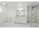 Modern bathroom with double vanity, marble shower, and updated fixtures offers a spa-like retreat at 4367 Albacore Cir, Port Charlotte, FL 33948