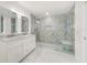 Spa-like bathroom with marble shower, double vanity, and modern fixtures at 4367 Albacore Cir, Port Charlotte, FL 33948