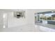 The pass-through kitchen offers views of the lanai and pool at 4367 Albacore Cir, Port Charlotte, FL 33948