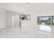 Open-concept floorplan connects the kitchen to the spacious, bright living area at 4367 Albacore Cir, Port Charlotte, FL 33948