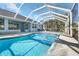 Large, screened pool with ample deck space at 4367 Albacore Cir, Port Charlotte, FL 33948