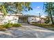 House with carport and spacious driveway at 2695 S East Ave, Sarasota, FL 34239