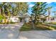 House with carport and mailbox; needs landscaping at 2695 S East Ave, Sarasota, FL 34239
