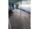 Covered patio with concrete flooring and outdoor seating area at 2695 S East Ave, Sarasota, FL 34239