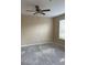 Bedroom with ceiling fan, neutral walls, and window with blinds at 19034 Narimore Dr, Land O Lakes, FL 34638