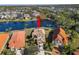 Property view showcasing a lake and surrounding houses at 14532 Mirasol Manor Ct, Tampa, FL 33626