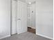 Bright bedroom with double closets and neutral walls at 10009 Connecticut St, Gibsonton, FL 33534