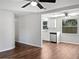 Open concept kitchen with stainless steel appliances and view of living room at 10009 Connecticut St, Gibsonton, FL 33534