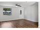 Spacious living area with hardwood floors and an entryway at 10009 Connecticut St, Gibsonton, FL 33534