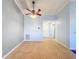 Living room with tile floors and ceiling fan at 11224 Villas On The Green Dr # 77, Riverview, FL 33579