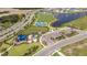 Community amenities including playground, basketball court and pond at 5807 Laurelcrest Gln, Palmetto, FL 34221