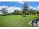 Dog park with benches and grassy areas at 5807 Laurelcrest Gln, Palmetto, FL 34221