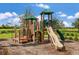 Playground with climbing structures, slide, and play area at 5807 Laurelcrest Gln, Palmetto, FL 34221