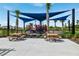 playground with shade structures and picnic tables at 5807 Laurelcrest Gln, Palmetto, FL 34221