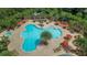 Resort-style pool with plenty of lounge chairs and a hot tub at 5807 Laurelcrest Gln, Palmetto, FL 34221