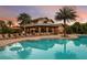 Community pool with clubhouse reflection at 5807 Laurelcrest Gln, Palmetto, FL 34221