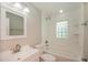 Clean bathroom with tub, shower, and updated fixtures at 23104 Newcun Ave, Punta Gorda, FL 33980