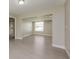 Spacious bedroom with neutral walls and wood-look flooring at 23104 Newcun Ave, Punta Gorda, FL 33980