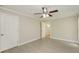 Spacious bedroom with ceiling fan and laminate flooring at 23104 Newcun Ave, Punta Gorda, FL 33980