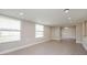 Simple dining room with neutral walls and wood-look flooring at 23104 Newcun Ave, Punta Gorda, FL 33980