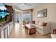 Living room with built-ins and ocean view at 3010 Grand Bay Blvd # 472, Longboat Key, FL 34228