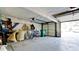 Garage with automatic door opener and storage at 6809 9Th W Ave # 0, Bradenton, FL 34209