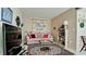 Small living room with sofa, shelving and TV at 6809 9Th W Ave # 0, Bradenton, FL 34209