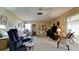Spacious living room with carpeted floors and ample seating at 6809 9Th W Ave # 0, Bradenton, FL 34209