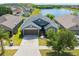 Single-Gathering home with lake view in a residential community at 14308 Edinburgh Moor Dr, Wimauma, FL 33598
