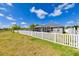 House with screened patio and large backyard at 14308 Edinburgh Moor Dr, Wimauma, FL 33598