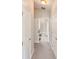Hallway leading to bedrooms and bathroom at 14308 Edinburgh Moor Dr, Wimauma, FL 33598