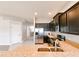 Kitchen features stainless steel appliances and granite countertops at 14308 Edinburgh Moor Dr, Wimauma, FL 33598