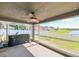 Screened lanai with hot tub and backyard view at 14308 Edinburgh Moor Dr, Wimauma, FL 33598