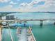 Aerial view of bridge, marina, and boats on the water at 270 Skiff Pt # A-5, Clearwater Beach, FL 33767